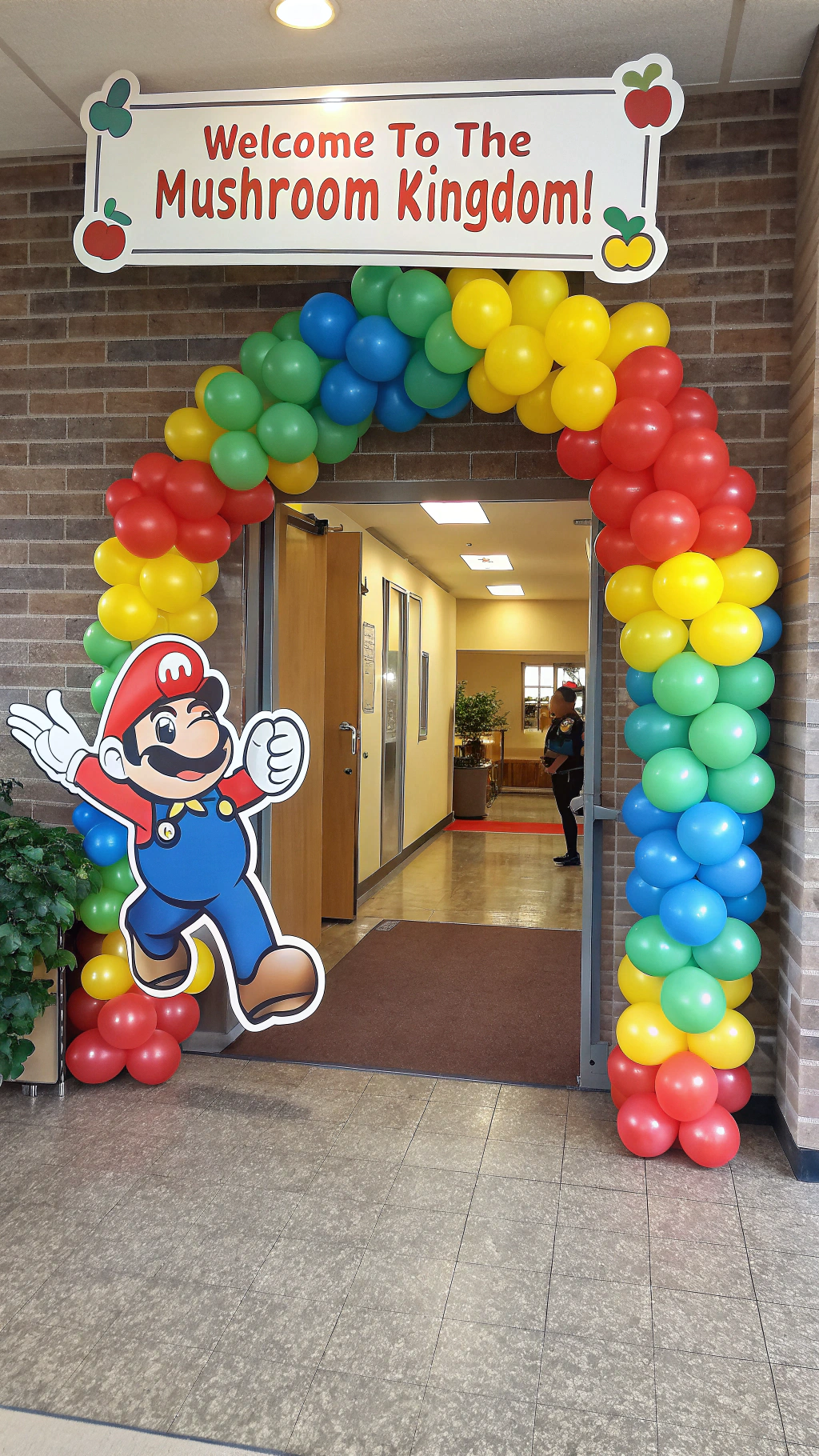014 Super Mario party backdrop ideas with balloon arch and welcome sign for kids parties - Themed Ideas