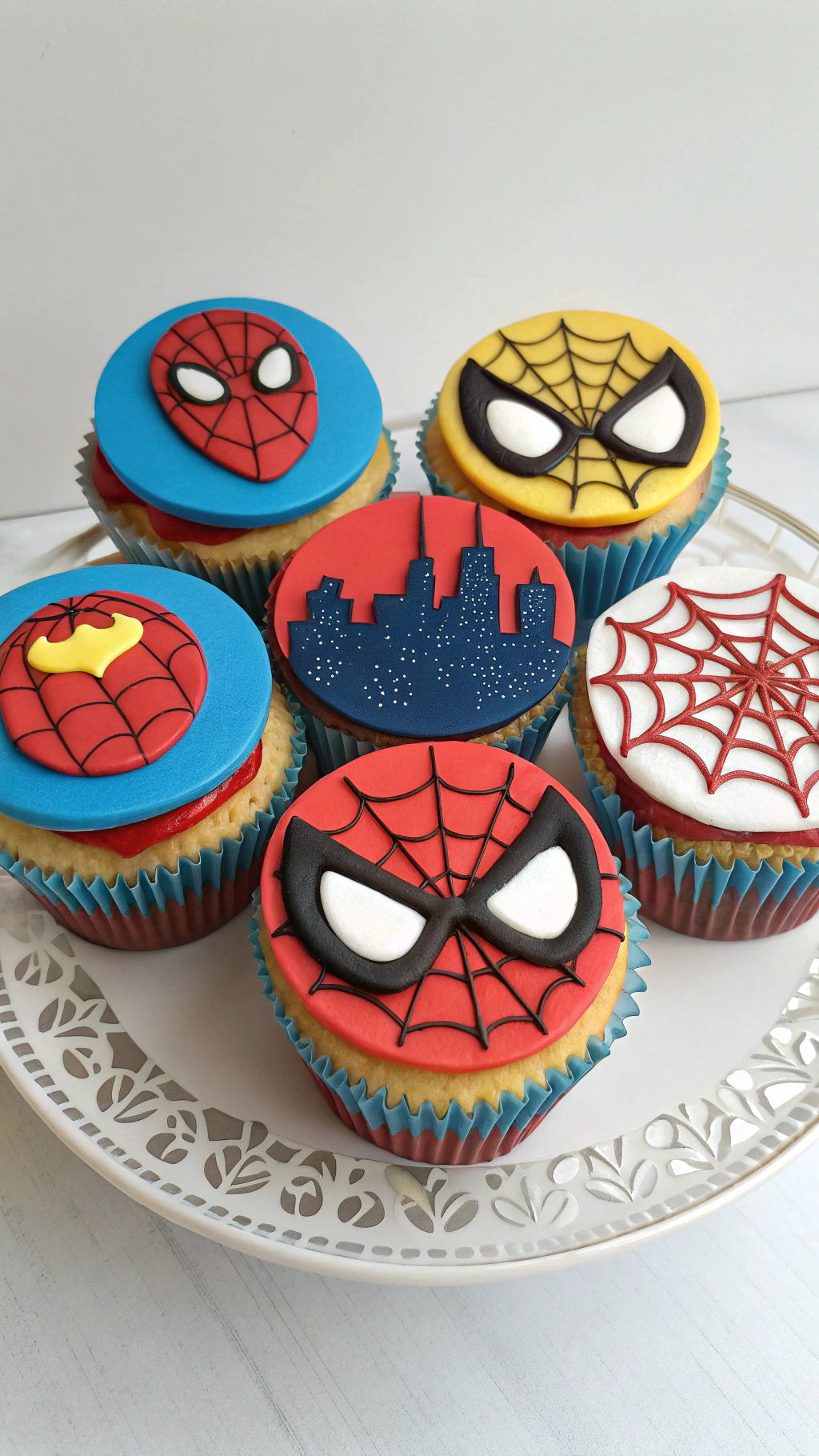 043 Cute Spiderman Birthday Cupcake with Mini Fondant Figure and Blue Icing Web Detail - Themed Ideas