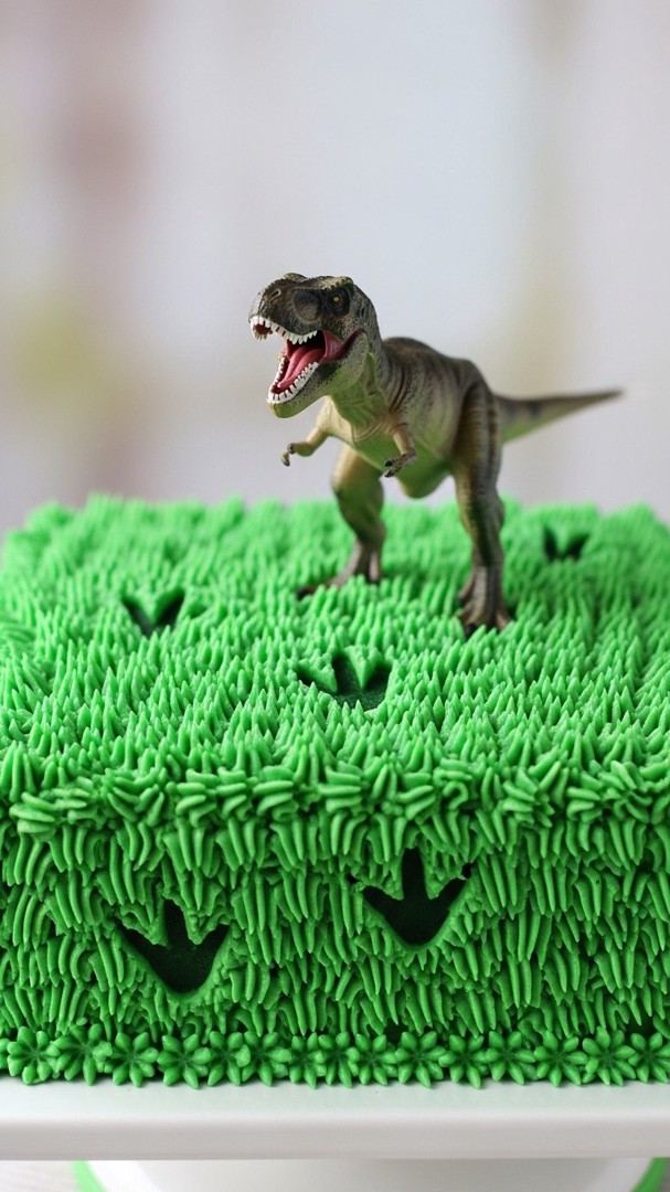 013 Dinosaur Birthday Cake Idea with T Rex Toy and Icing Footprints - Themed Ideas